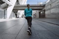 Young adult sporty girl stretching outdoor in city Royalty Free Stock Photo