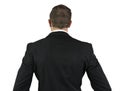 Back view of a young businessman in formal wear on a white background Royalty Free Stock Photo