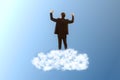Back view of young caucasian businessman standing on cloud. Blue sky background. Dream big, business and strategy, forethought and