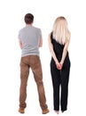 Back view of young couple hug and look into the distance. Royalty Free Stock Photo