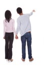 Back view of young couple pointing Royalty Free Stock Photo