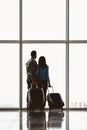 Back view.Young couple with suitcases Royalty Free Stock Photo