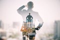 Back view of european businessman standing on abstract city background. Success, future and ceo concept. Double exposure Royalty Free Stock Photo