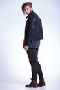 Back view of a young fashion man in leather jacket Royalty Free Stock Photo