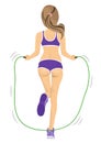 Back view of young fitness woman jumping rope