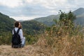 Back View of young girl with backpack at nature Royalty Free Stock Photo