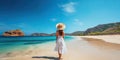 Back view young happiness asian traveller woman in white dress and hat standing on beautiful sandy beach