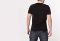 Back view. Young man wearing blank t-shirt isolated on white background. Copy space. Place for advertisement. Royalty Free Stock Photo