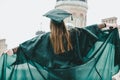 Back view young woman graduating