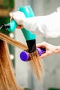 Young woman receiving drying hair Royalty Free Stock Photo