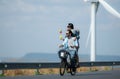 young woman riding a bicycle with her boyfriend on the road Royalty Free Stock Photo