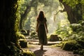Back View of Young Woman Standing On Path In Forest between the woods Royalty Free Stock Photo