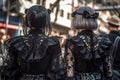 Back view of young women in Gothic Lolita fashion style. Royalty Free Stock Photo