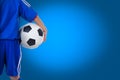 Back view of youth soccer player in blue uniform Royalty Free Stock Photo