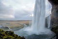 Back of a waterfall out of cave Royalty Free Stock Photo