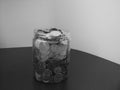 Back and white jar of change Royalty Free Stock Photo