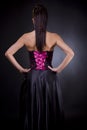 Back of a woman in cocktail dress Royalty Free Stock Photo