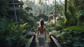 back of woman standing in balinese jungle