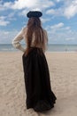 Woman back beach black rose crown, De Panne, Belgium Royalty Free Stock Photo