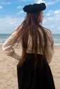 Woman back beach black rose crown, De Panne, Belgium Royalty Free Stock Photo