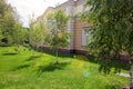 Back yard of a building with a rustication and a green lawn. Royalty Free Stock Photo