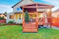 Back yard house exterior with wooden walkout deck