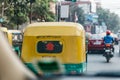 The back of yellow and green taxi meter on the street in Kolkata, India. Royalty Free Stock Photo