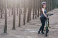 Back young female woman helmet catch bicycle Royalty Free Stock Photo