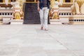 Back of young man backpacker walking towards Burmese temple named Buddha Relic Tooth Pagoda in Yangon, Myanmar Royalty Free Stock Photo