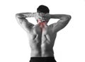 Back young muscular sport man holding sore neck touching massaging cervical area Royalty Free Stock Photo