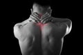 Back young muscular sport man holding sore neck touching massaging cervical area Royalty Free Stock Photo