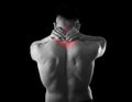 Back young muscular sport man holding sore neck touching massaging cervical area Royalty Free Stock Photo