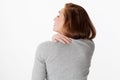 Backache concept, 20s woman in back view with shoulders and neck tension Royalty Free Stock Photo