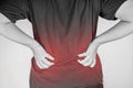 Backache injury in humans .backache pain,joint pains people medical, mono tone highlight at backache