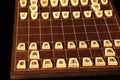 Backboard and pieces of Shogi