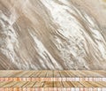 Backdrop abstract marble wall and wood slabs arranged in perspective texture background.. Royalty Free Stock Photo