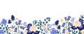 Backdrop with border of spring blooming flowers. Bluebells, irises, eucalyptus, eryngium and forget-me-nots isolated on