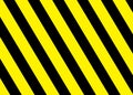 A backdrop of bright yellow and black stripes - the safety warning caution label sign