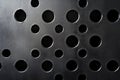 A backdrop featuring a black circle pattern on a dark grey textured surface. Royalty Free Stock Photo