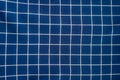 Dark blue squares on textile