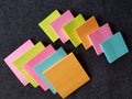 paper notebooks for notes stacked in phosphorescent colors, background and texture