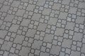 Backdrop - pavement of curved grey interlocking concrete tiles Royalty Free Stock Photo
