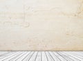 Backdrop sandstone wall and wood slabs arranged in perspective texture background. Royalty Free Stock Photo