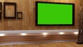 Backdrop for TV shows TV on wall, room empty News studio and background Tv green screen. Royalty Free Stock Photo