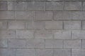 Backdrop - wall made of gray concrete masonry units Royalty Free Stock Photo