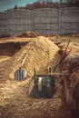 Backfilling of the excavation under the foundation slab. Construction, dolomite, shovels and wheelbarrow. Royalty Free Stock Photo