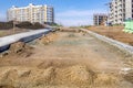 backfilling of the roadbed and arrangement of footpaths in the area under construction