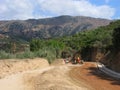 Backfilling and widening of the road in mountains Royalty Free Stock Photo