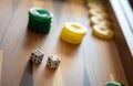 Backgammon, dice and chips closeup on game board Royalty Free Stock Photo