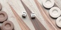 Backgammon, dice and chips closeup on game board. 3d illustration Royalty Free Stock Photo